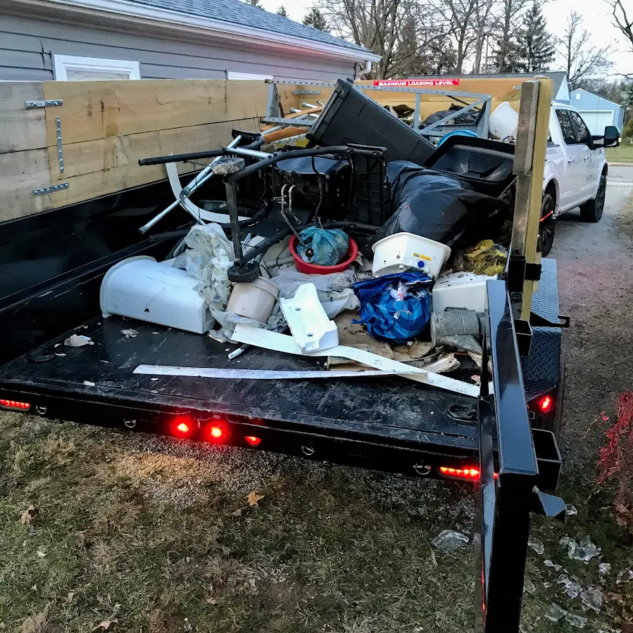 Roll-off dumpster delivered to a residential driveway in Unionville