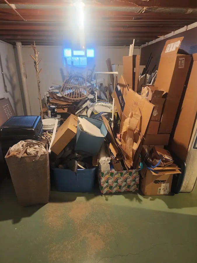 Roll-off dumpster container at job site for 2 Yard Dumpster Rental in Unionville